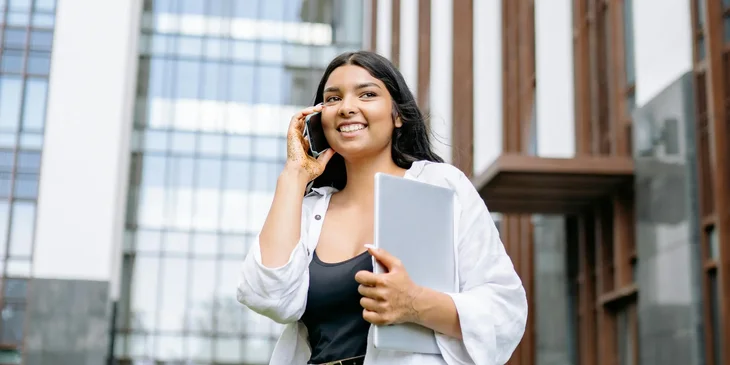 A woman talking on her mobile phone.
