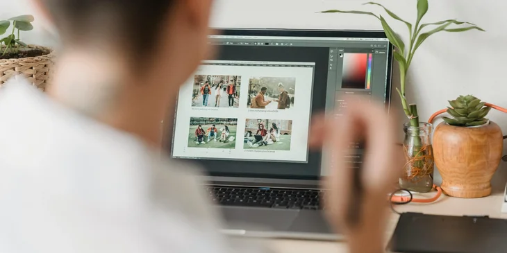 An assistant editor editing images for an upcoming content.