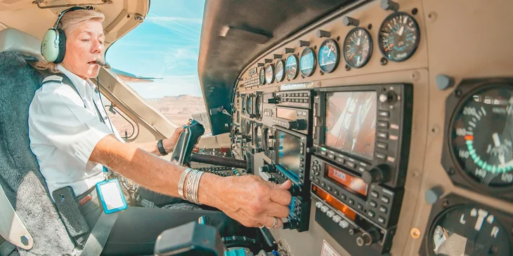 A pilot flying a plane.