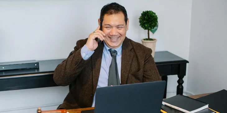 A man talking on the phone.
