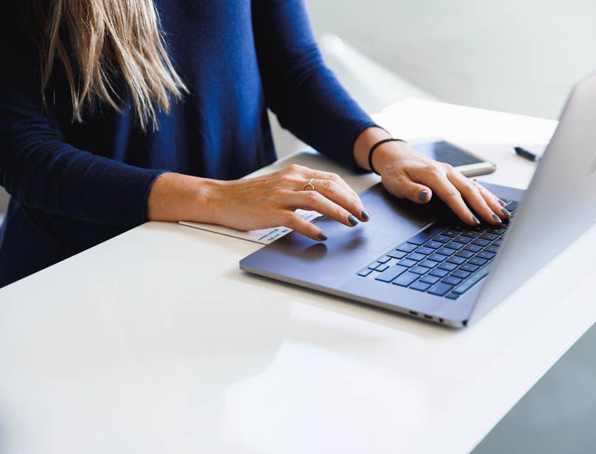 A hiring manager advertising a vacancy on the best job posting sites for employers.
