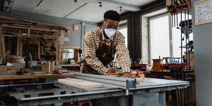 A blue-collar worker in a workshop.