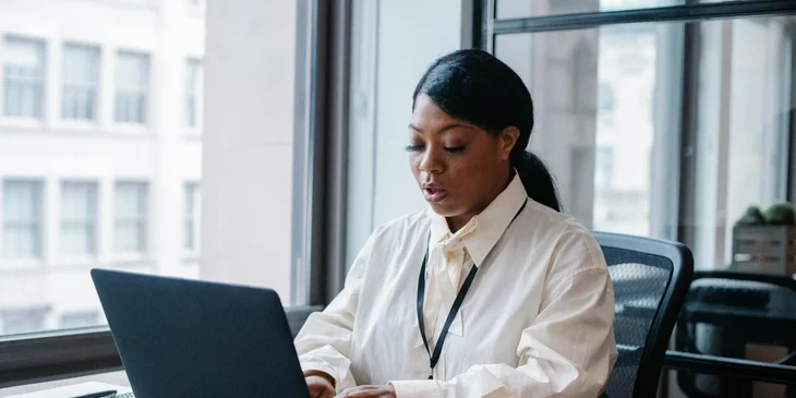 A branch manager preparing sales and performance reports.