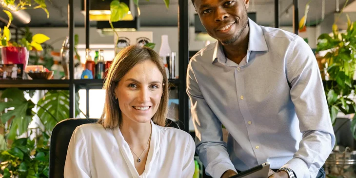 Two colleagues preparing for a meeting.