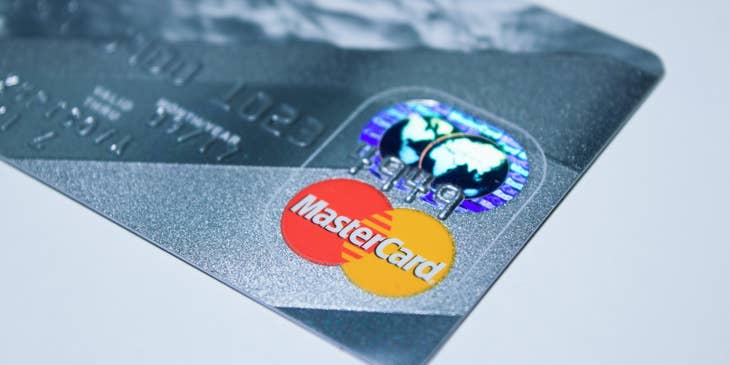Blue Mastercard on a table