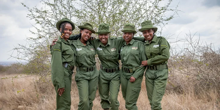 Female wildlife rangers posing for a photo.