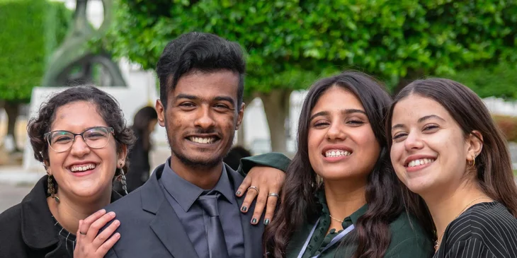 A group of colleagues smiling.