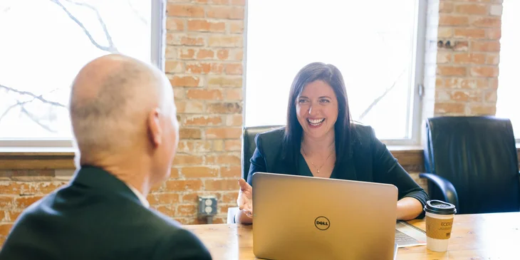 A digital marketer having a conversation with a client.