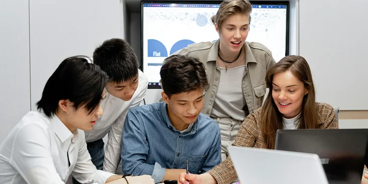 A group of colleagues working together on a project.