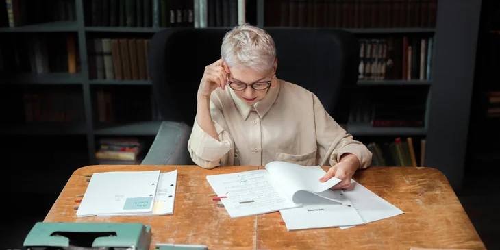 An editor reviewing a script.