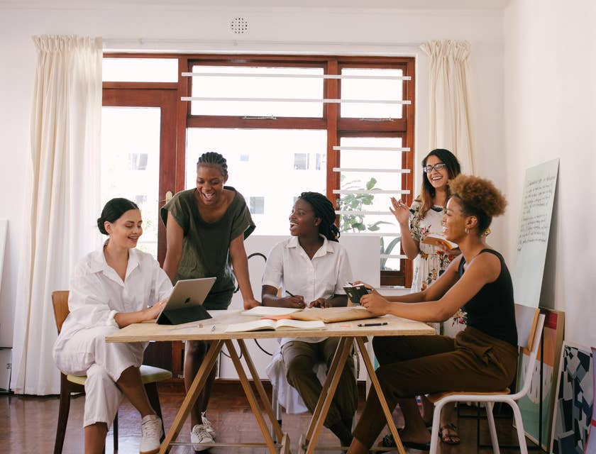 A group of employees engaged in conversation.