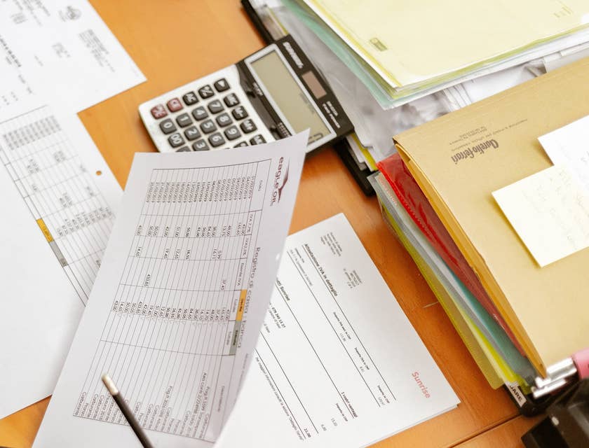 employee holding employee information forms