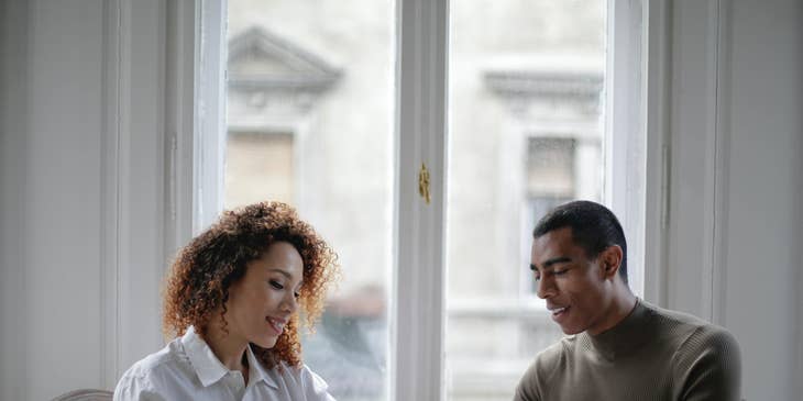 Employer speaking to an employee over documents