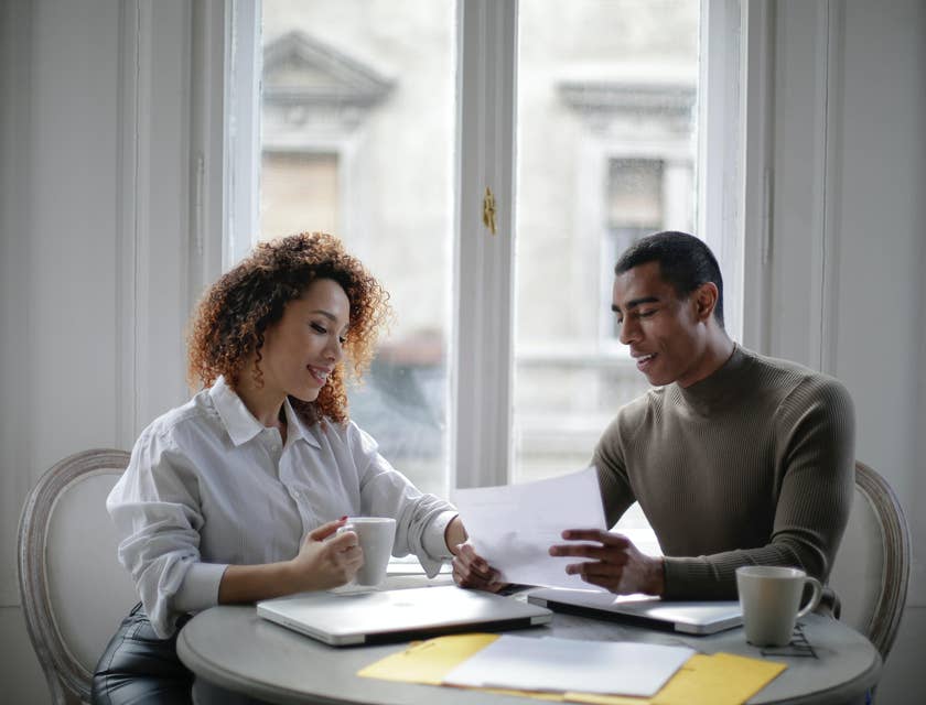 Employer speaking to an employee over documents