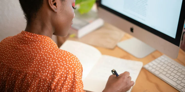 A woman working with a verification letter.