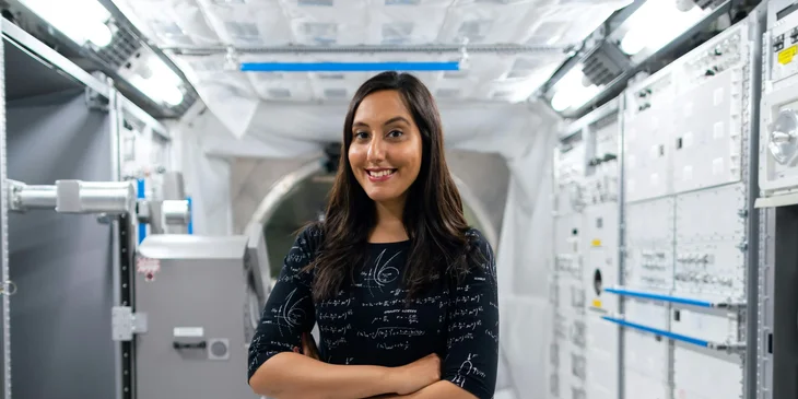 A female engineer in a space station.