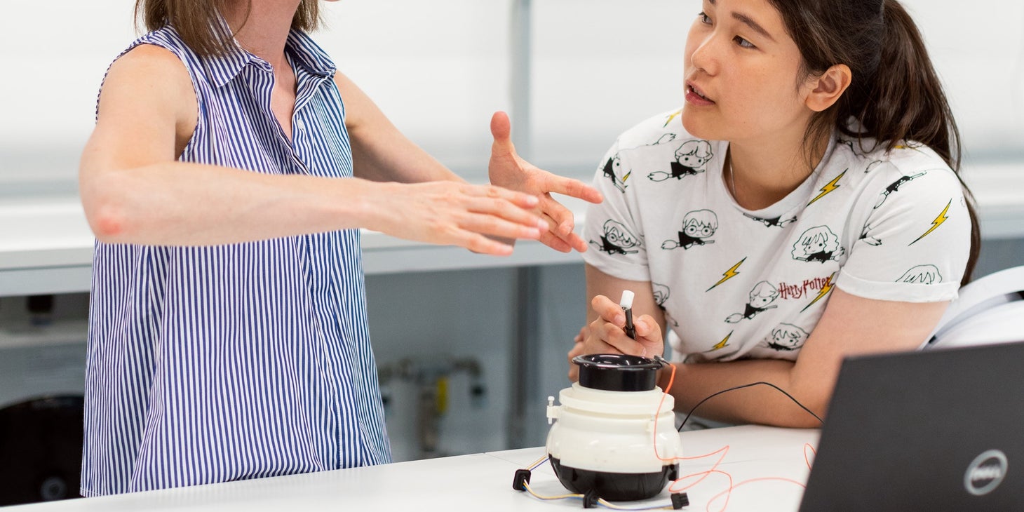 engineering interns working in an office.