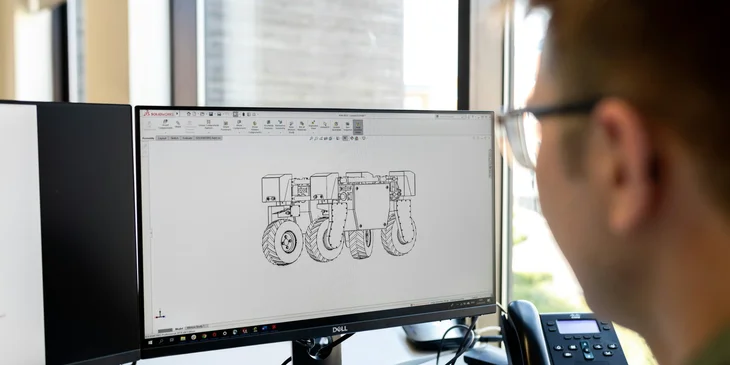 A robotics engineer working on a project.