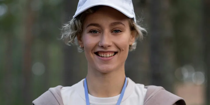 A cheerful volunteer.
