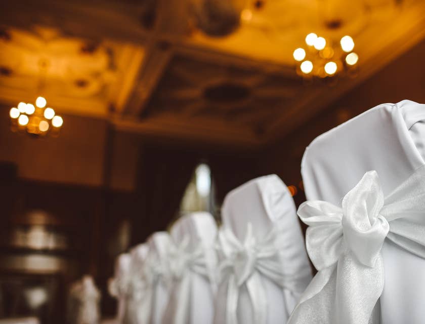 Chairs with white tiebacks at an event