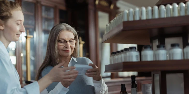 A field sales representative assisting a potential customer with product selection.