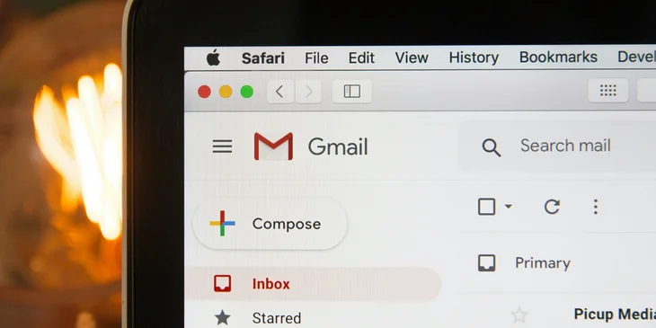 A laptop open in gmail ready to write a follow-up email after an interview.