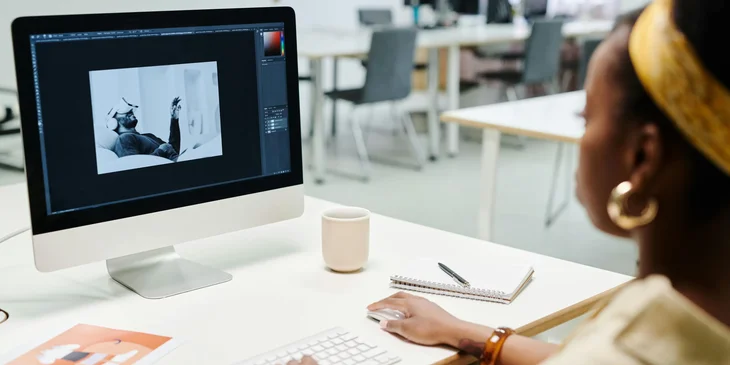 An animator working on an animation project on her computer.