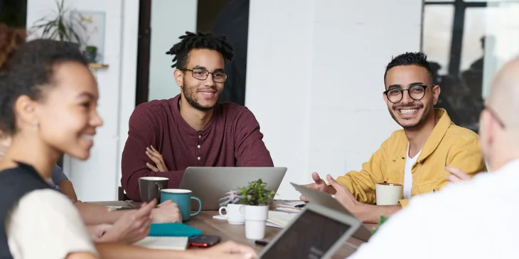A group of interns collaborating.