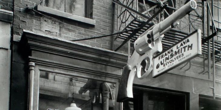 A gunsmith's shop signage.