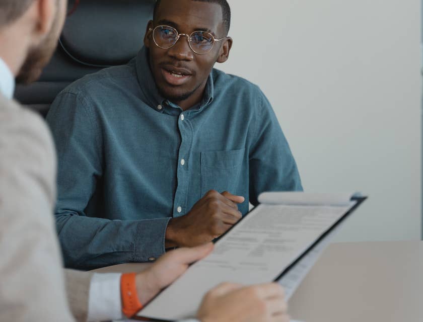 A man being interviewed about his strengths and weaknesses.