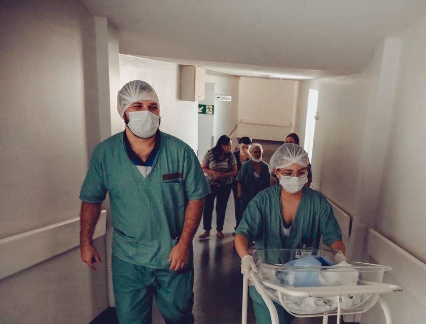 Nurses walking down a hospital corridor.
