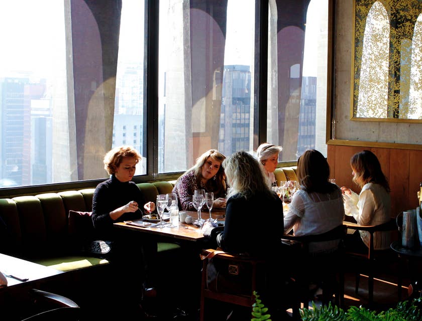 Restaurant staff sitting at a table.