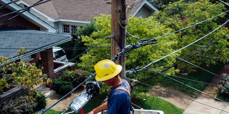 An electrician repairing electrical wires.