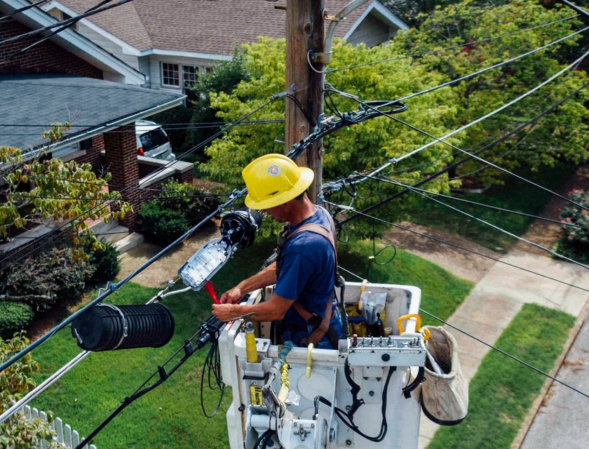 An electrician repairing electrical wires.