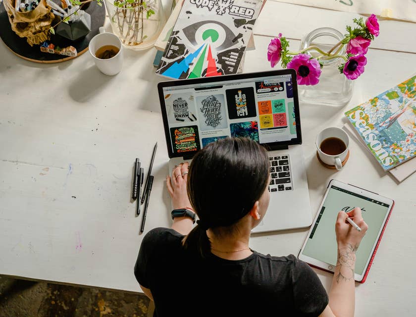photograph of graphic designer working at a desk