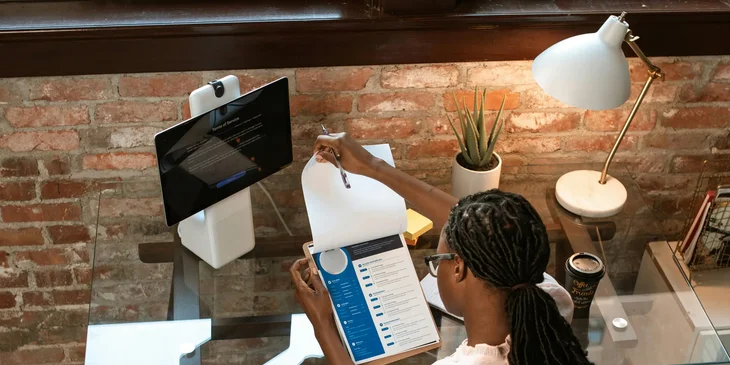 A woman creating a functional resume.