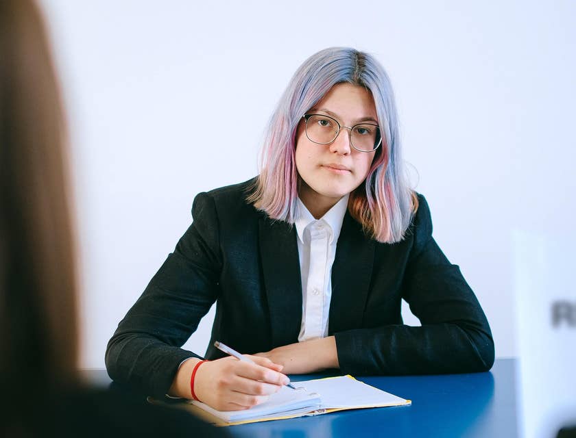 A woman preparing a functional resume.