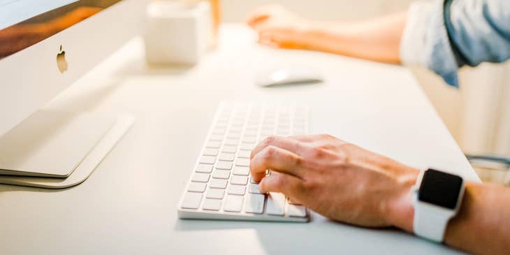 person writing an email to the hiring manager