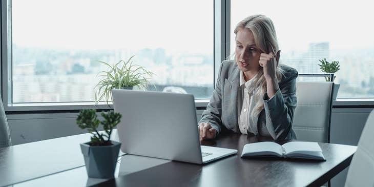 HR supervisor taking a phone call in a meeting room