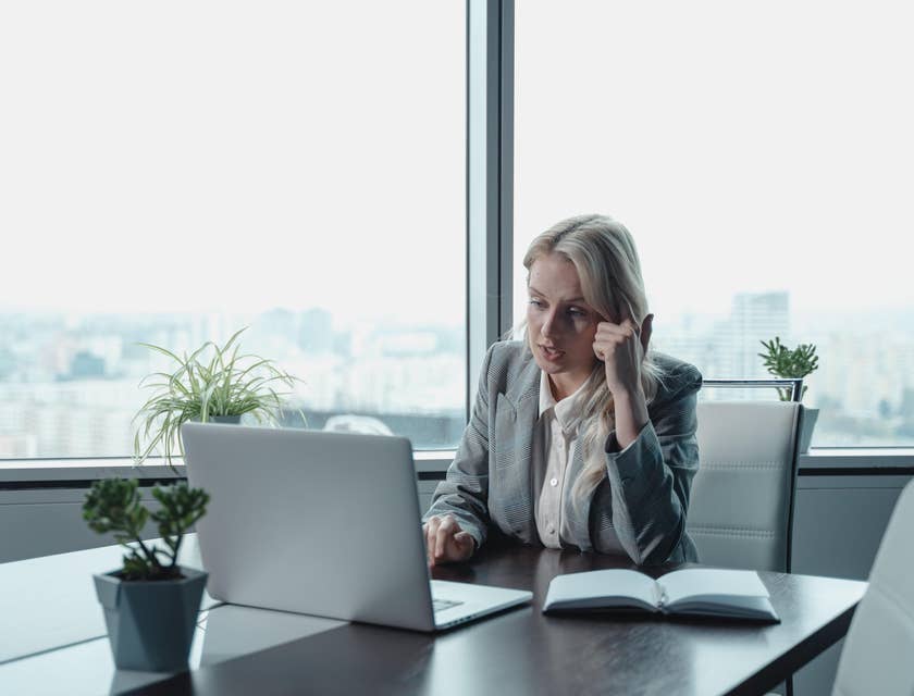HR supervisor taking a phone call in a meeting room