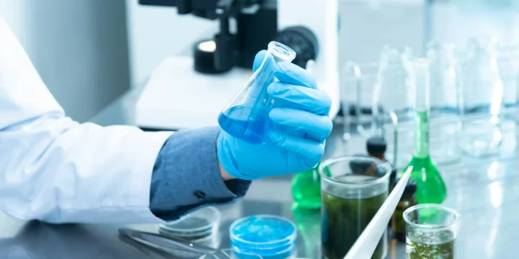 A hydrologist testing water samples.