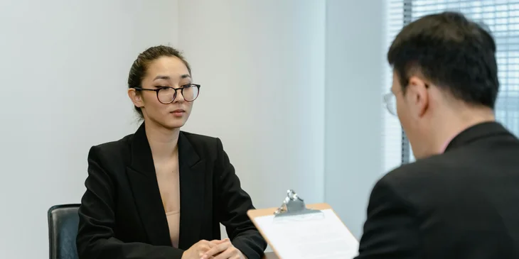 An intern being interviewed for a role.
