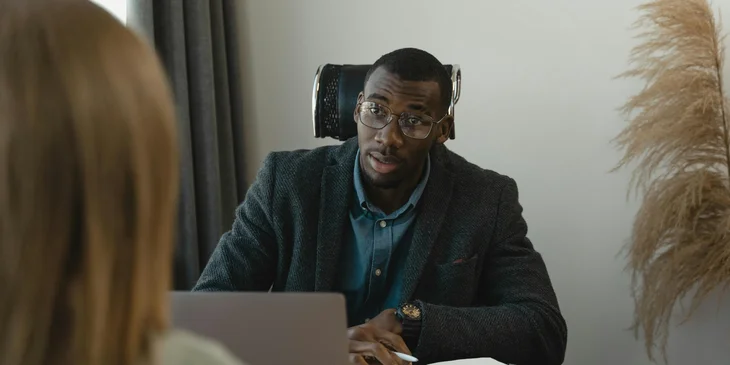 An internal recruiter conducting an interview with a candidate for a job.
