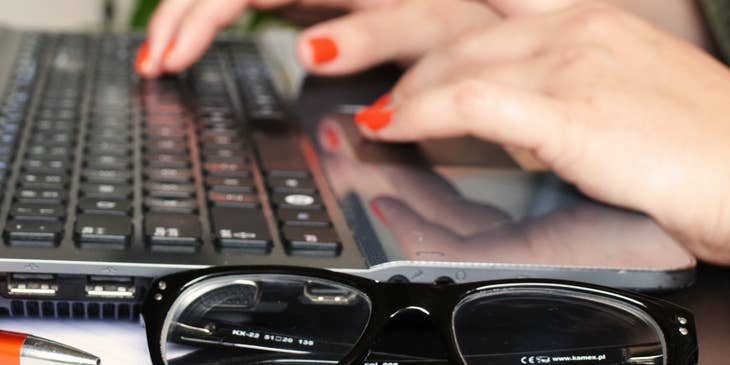 woman writing interview confirmation email