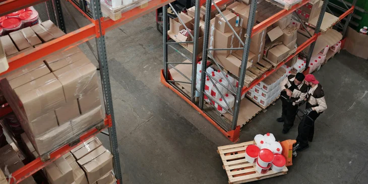 An inventory analyst coordinating with a coworker regarding the company's inventory.