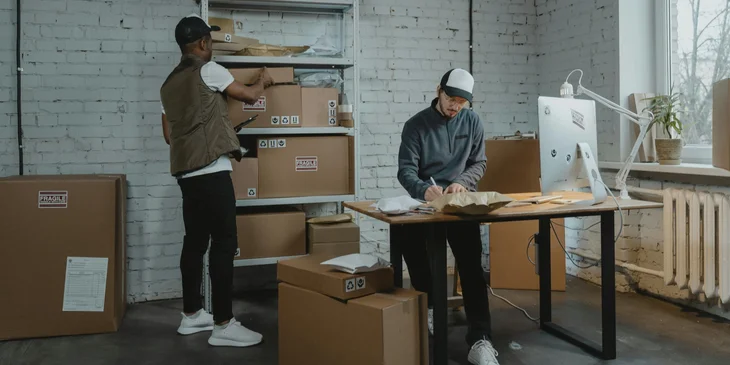 Inventory clerks going through the stock.
