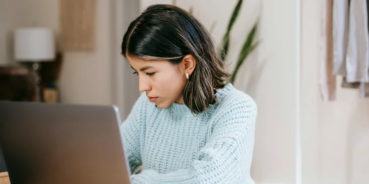 A woman working at an office.