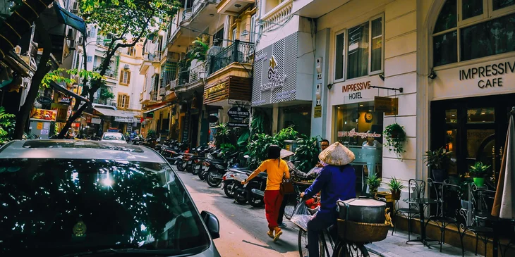 Buildings lining a street in Hanoi, Vietnam.