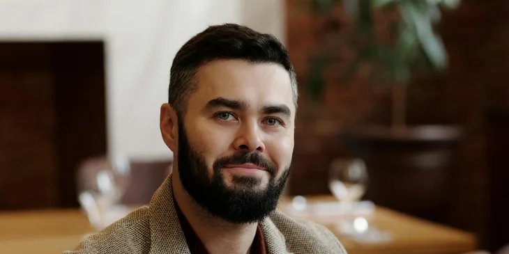 A man smiling at the camera.