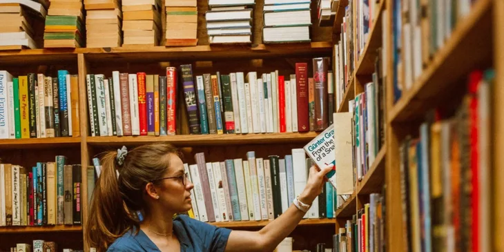 A woman working in a bookstore.